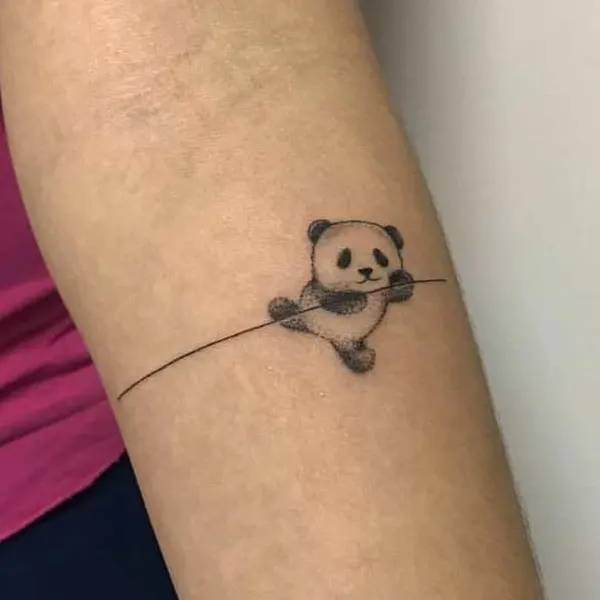Tatuagem feminina de panda