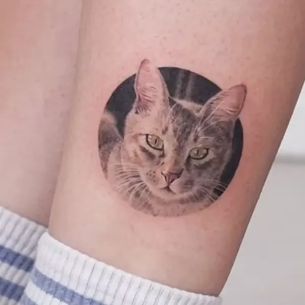 Tatuagem de animal na canela