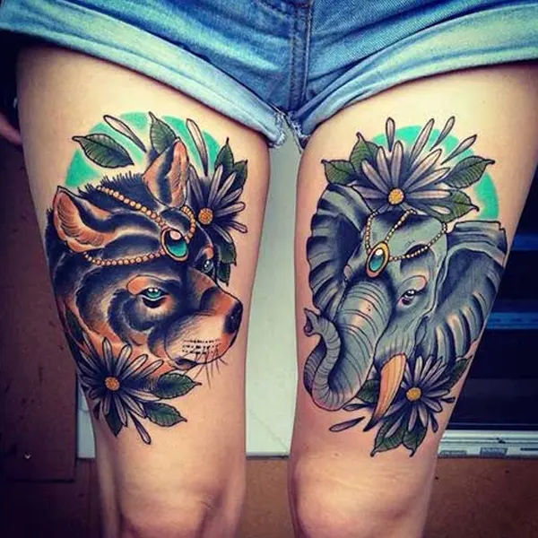 Tatuagem de animal na coxa