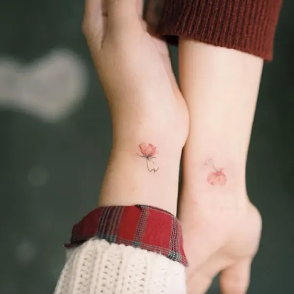 tatuagem floral mãe e filha