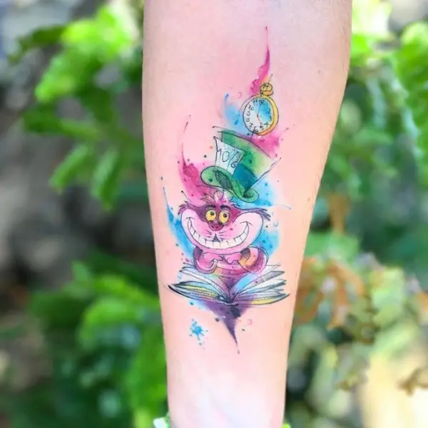 tatuagem feminina no braço aquarela 1