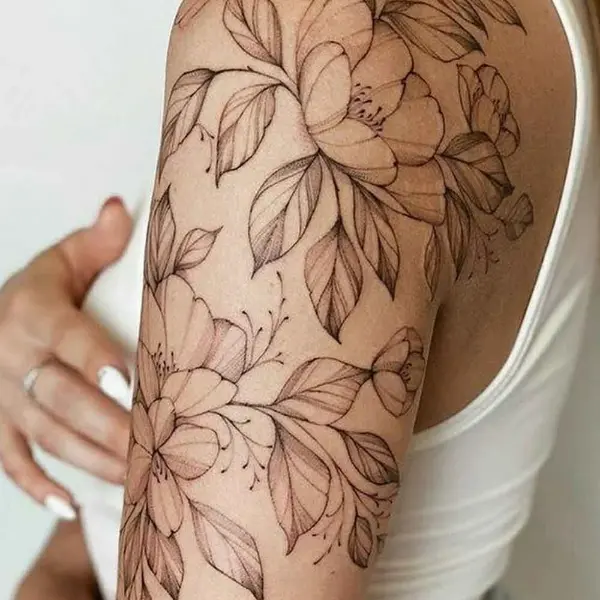 tatuagem feminina no braço floral 4